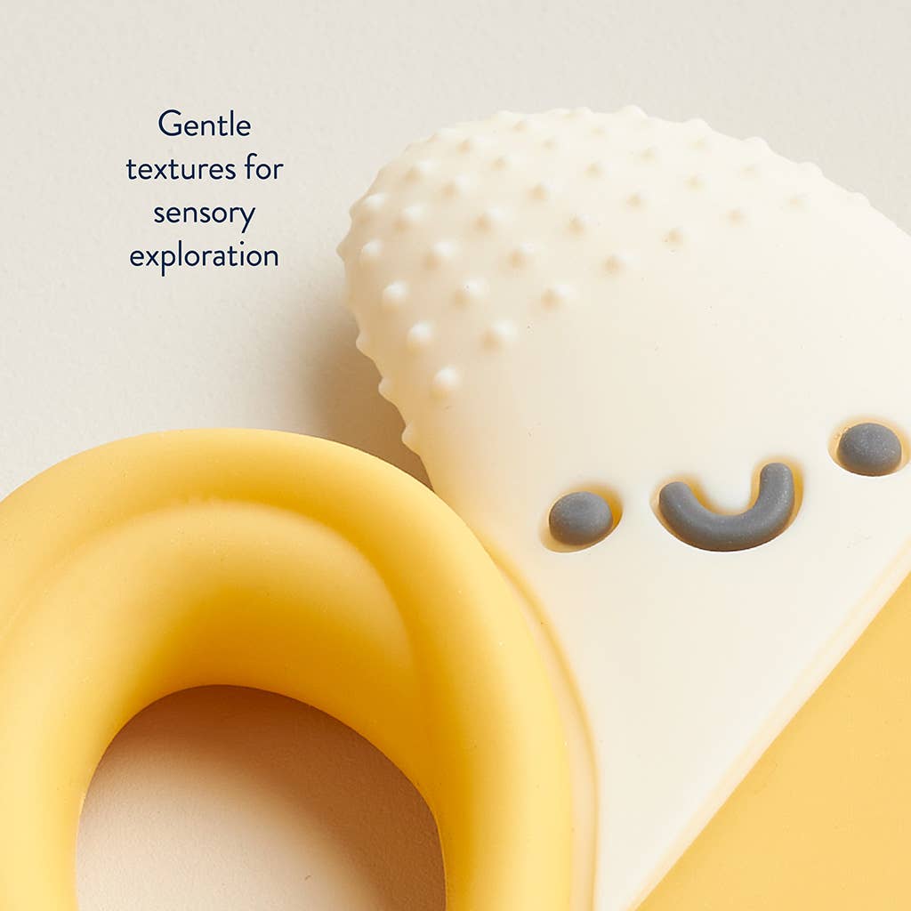 Banana Chew Crew Silicone Teether with gentle textures for sensory exploration, providing soothing relief for baby's teething gums.